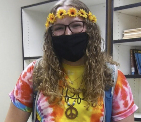 Mckenzie Mangum dressed as a hippie.