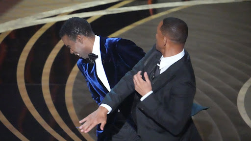 Chris Rock gets Slapped by Will Smith following making a GI Jane joke about Smith’s wife.