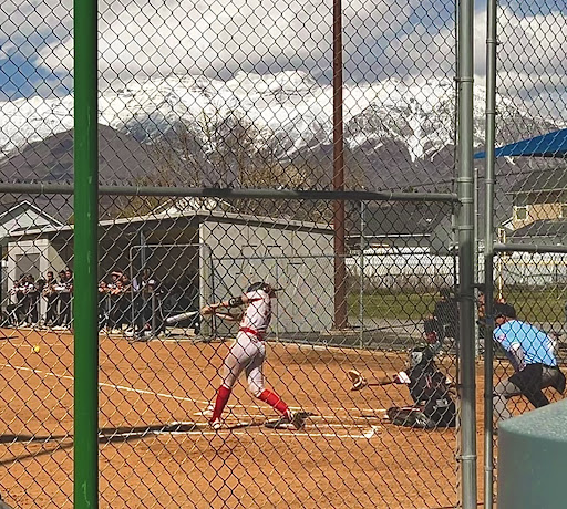 Taylor Lewis batting at a game on April 15.