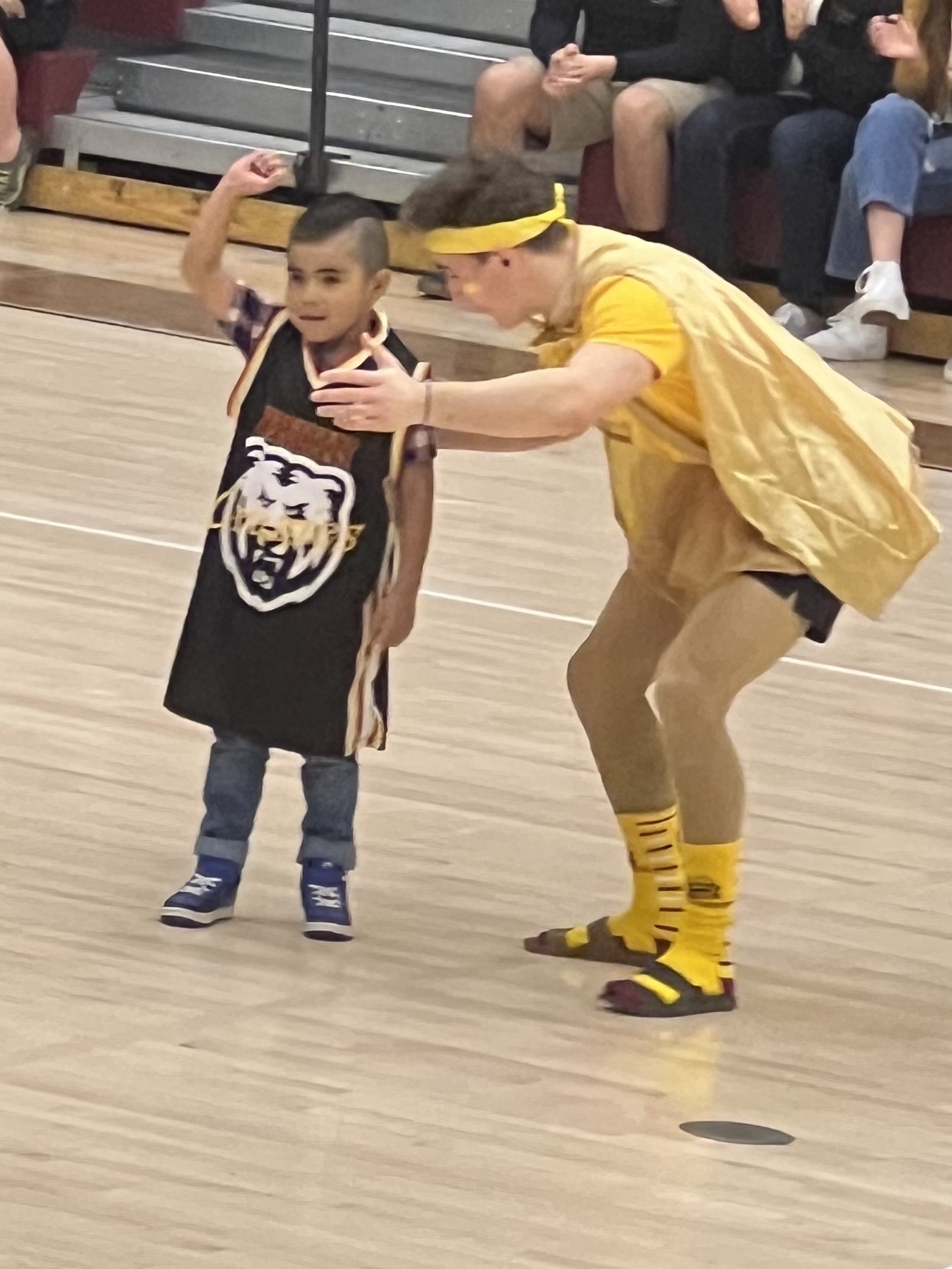 Ivan, Mountain Views Wish Week kid, selects the winner for the dance completion during the assembly on Thursday. Wish week is a moving tradition at Mountain View where the school bands together to support a child with a critical illness in receiving a wish.